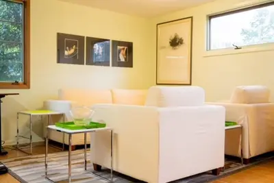 a living room with white chairs and tables at Quiet place with easy access NYC in River Edge