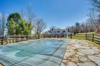 an image of a pool with a fence at Serene Retreat Near Mt Snow Great for Groups! in Marlboro