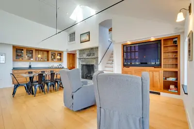 a kitchen and dining room with a table and chairs at Wellness Retreat with Views! Upscale Marlboro Cabin in Marlboro