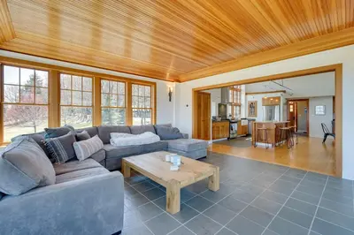 a living room with a couch and a table at Wellness Retreat with Views! Upscale Marlboro Cabin in Marlboro