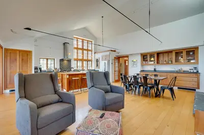 a kitchen and living room with chairs and a table at Wellness Retreat with Views! Upscale Marlboro Cabin in Marlboro