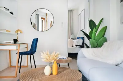 a living room with a couch and a table at 48-1FE Brand New 1BR Prime hell's kitchen WD in unit in New York