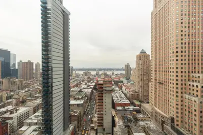 an aerial view of a city with tall buildings at Modern Bright Times Sq 1BR w Indoor pool NYC-8 in New York