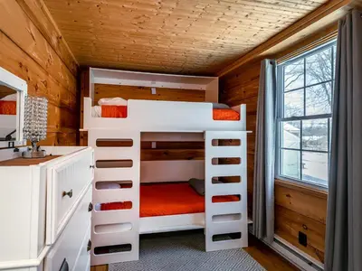 a bedroom with a bunk bed in a house at Cozy 2-bedroom Cottage with Access to Bantam Lake in Morris