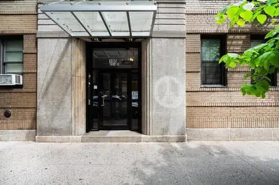 an entrance to a building with a revolving door at 105 -5G Brand New Studio prime location Elevator in New York