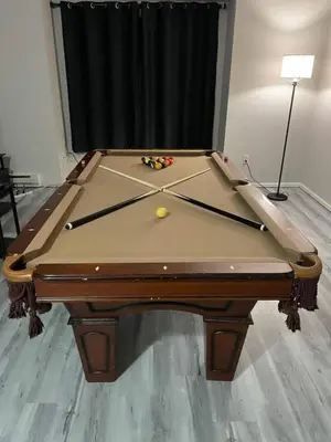 a pool table with cue balls on top of it at Private Apartment in Southbury 101 in Southbury