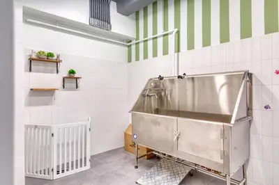 a bathroom with a metal tub in a room at Midtown East 2br w gym wd nr Grand Central NYC-1146 in New York