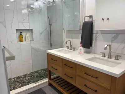 a bathroom with a sink and a shower at Sweet Home - 20 minutes to NYC in Jersey City