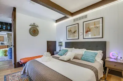 a bedroom with a large bed with towels on it at East Fishkill Escape, Close to Red Wing Park! in Hopewell Junction