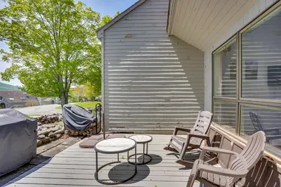a porch with two chairs and a table on a house at Windham Mountain Vacation Rental about 3 Mi to Lifts! in Windham