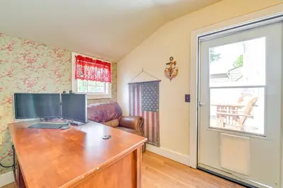 a home office with a desk with a computer on it at Pet-Friendly Gloversville Cottage Near Golf Course in Gloversville