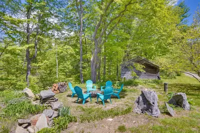 a group of chairs and a table in a yard at Family Ski Getaway 6 Mi to Berkshire East! in Hawley