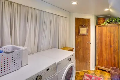 a white washing machine in a room with a window at Family Ski Getaway 6 Mi to Berkshire East! in Hawley