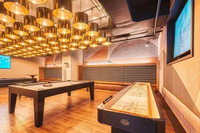 a room with a pool table and a tv at FiDi 1br w gym doorman wd nr Wall St NYC-983 in New York