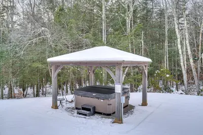 a gazebo with snow on top of it at 6 Mi to Hunter Mtn Winter Retreat with Hot Tub! in Tannersville