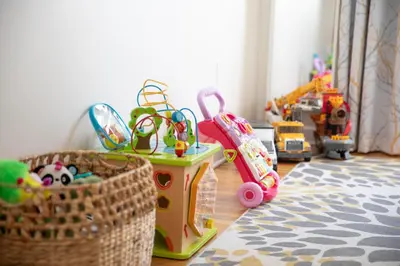 a room with toys and a basket on a floor at Entire House Right In Stamford's Heart in Stamford