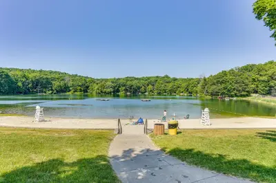 a park with a beach and a body of water at All-Season Vernon Township Lake House Retreat! in Vernon Township
