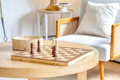a chess board on a table in a living room at Fairfield Cottage -Top Rated Gem, Fire Pit, Near Beach, 90 Min to NYC in Fairfield