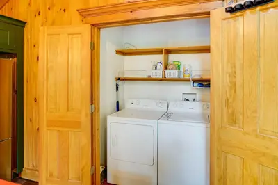 a white washer and dryer in a small room at Secluded Elka Park Cabin Hot Tub and Fire Pit! in Elka Park