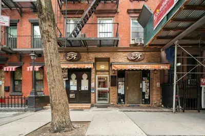 a building on the corner of a city street at Times Square Studio near Restaurants & Shopping in New York
