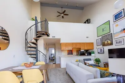 a living room with a couch and a table at Cozy 2BR condo w/ valley views in Vernon Township