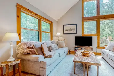 a living room with a couch and a tv at 219 Old Ark Road in Wilmington
