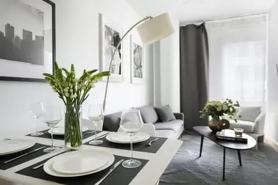 a dining room with a table with wine glasses at Beautiful 2BD Apartment near Times Square in New York