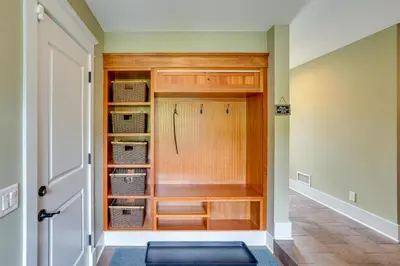 a walk in closet with wicker baskets in it at Stockbridge Retreat with Pool and Hot Tub! in Stockbridge