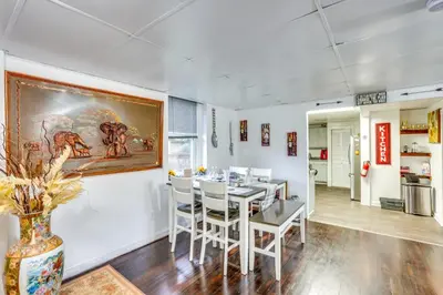 a dining room with a table and a painting on the wall at Cozy Berkshires Vacation Rental Near Hiking! in Chester