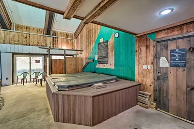 a large room with a bed and a table at Wilmington Vacation Rental Near Hiking and Skiing! in Wilmington