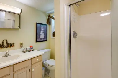 a bathroom with a toilet and a sink and a shower at West Dover Home - Steps to Mount Snow Resort! in West Dover