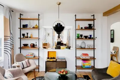 a living room with a table and shelves at The Norsdale plus CMYK Motel on 10 acres in Phoenicia in Phoenicia