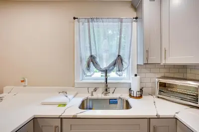 a kitchen counter with a sink and a window at Monterey Haven Less Than half Mi to Lake Garfield with Kayaks in Monterey