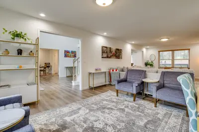 a living room with a couch and chairs and a table at Hot Tub and Lake Access Spacious Tobyhanna Home in Tobyhanna
