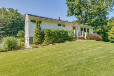 a house with a large lawn in front of it at Pet-Friendly Staatsburg Studio - Near State Park in Staatsburg