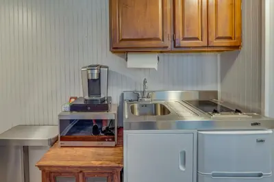 a kitchen with a sink and a counter top at Pet-Friendly Staatsburg Studio - Near State Park in Staatsburg