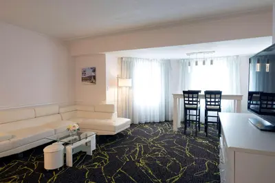 a living room with a couch and a table at The Roslyn, Tapestry Collection by Hilton in Roslyn