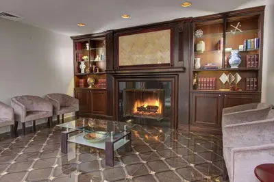 a living room with a fireplace and couches at The Roslyn, Tapestry Collection by Hilton in Roslyn
