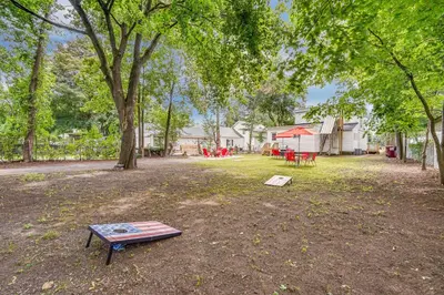 a park with a picnic table and a bench at Cozy Glens Falls Getaway Less Than 1 Mi to Downtown in Glens Falls