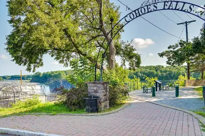 a sign that reads crooks falls at the niagara river at Contemporary Cohoes Retreat with Electric Fireplace! in Cohoes
