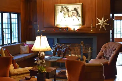 a living room with a couch and a fireplace at The Inn at Richmond in Richmond