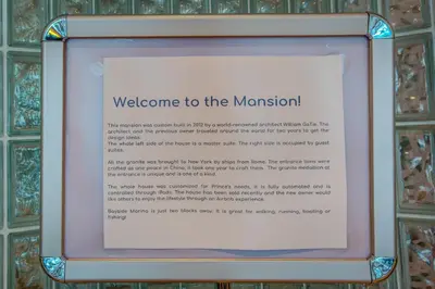 a sign that says welcome to the museum at GABLES new 2024 in Bayside