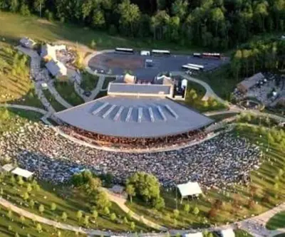 an overhead view of a large crowd of people at a concert at Bethel Woods Cabin in Mongaup Valley