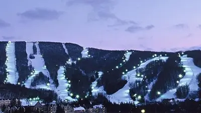 a view of a snow covered mountain with lights at Mountain View Suite on Jiminy Peak Ski On Off -New in Hancock