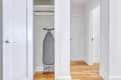 a skateboard is hanging in a closet at Midtown E 1BR w Gym Doorman nr the 6 NYC-4 in New York