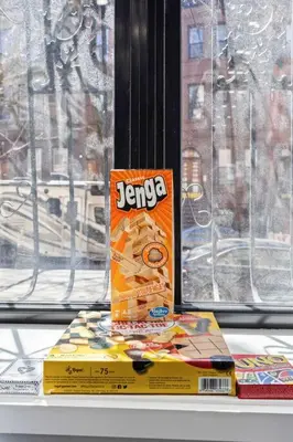 a box is sitting on top of a window at SWJ 3rd - Sleeps 7,Close to LGA,Times Sq in 25 min in New York