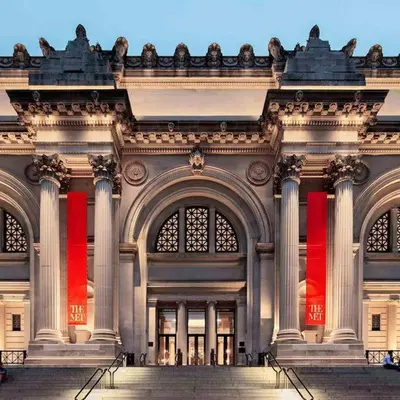 a large building with a red ribbon on it at SWJ 5th - Perfect for Tourism: Near Train, Times Sq, Dining in New York