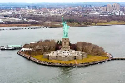 an aerial view of the statue of liberty in the water at SWJ 4th and 5th - Save on 2Day+ Stays_Duplex in New York