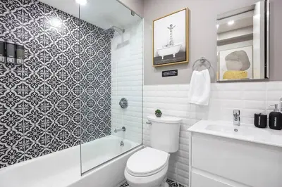 a bathroom with a toilet and a tub and a sink at SWJ Btm G, 1 and 2 - Save on 2Day+ Stays_6Br Triplex in New York