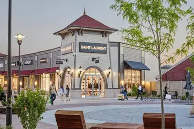 a rendering of the front of a shopping center at SWJ Btm G, 1 and 2 - Save on 2Day+ Stays_6Br Triplex in New York